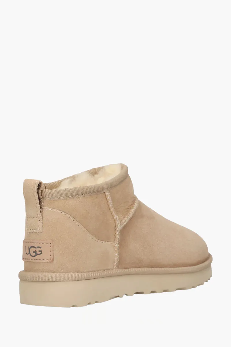 UGG Women Classic Ultra Mini Ankle Boots in Sand Suede with Logo 1