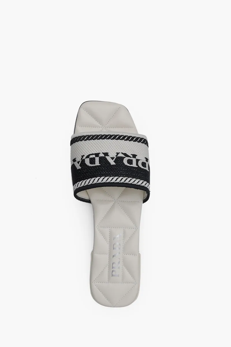 PRADA Women Embroidered Lettering Logo Slides in Black/Chalk White with Quilted Sole 3