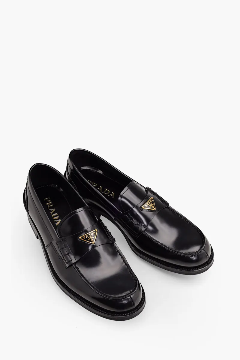 PRADA Men Moccasins Loafers in Black Leather with Enamelled Metal Triangle Logo 1