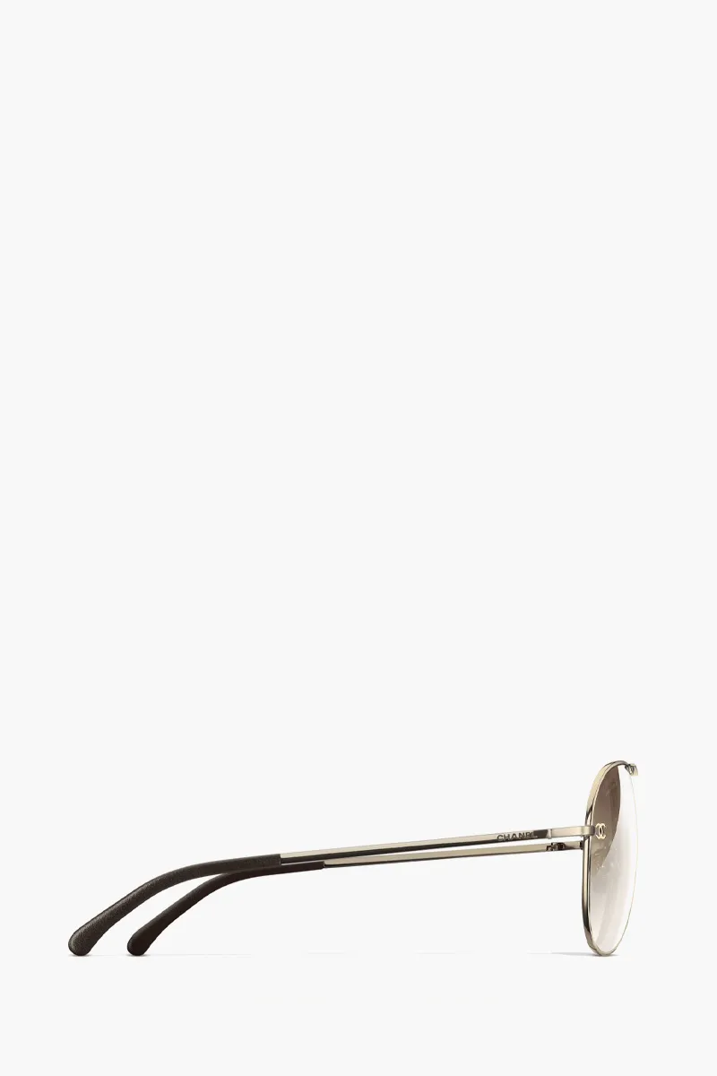 CHANEL Pilot Logo Sunglasses in Gold/Brown/Gradient Titanium/Calfskin 1