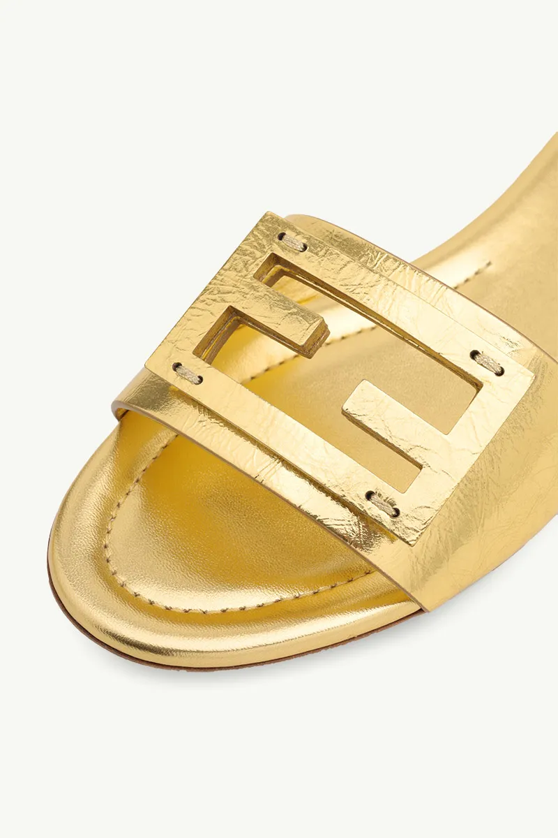 FENDI Women Siganture FF Baguette Slide Sandals in Gold Laminated Nappa Leather 4
